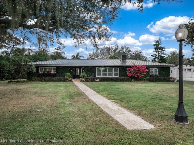 single story home with a front lawn