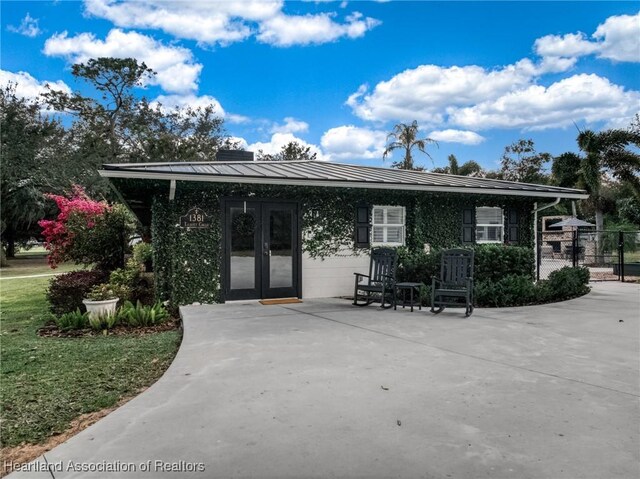 view of front of property featuring french doors