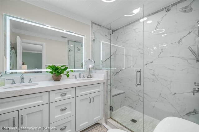 bathroom featuring vanity, an enclosed shower, and ornamental molding