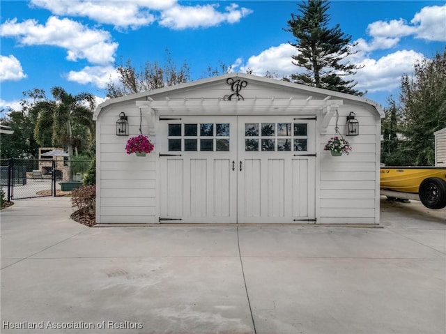 view of outdoor structure featuring a garage