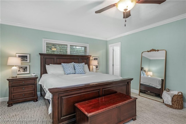 bedroom featuring light colored carpet, ceiling fan, and crown molding