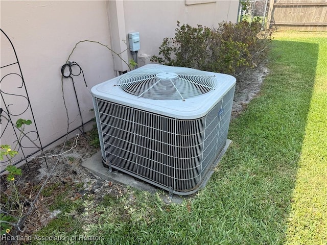 330 Sassafras Ave, Sebring, FL 33870 - exterior view of central air condition unit, stucco siding, and fence