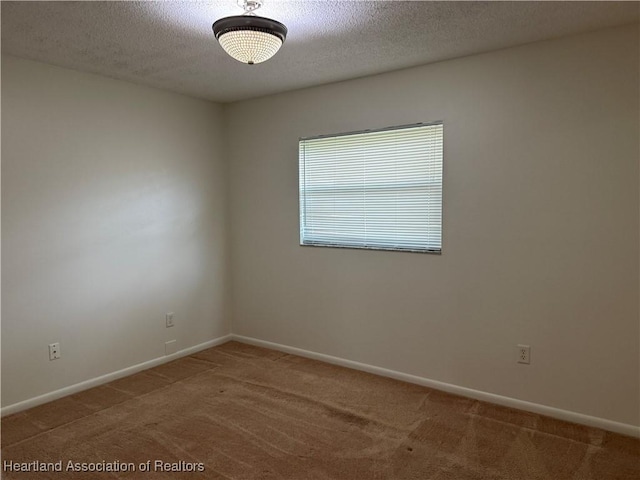 330 Sassafras Ave, Sebring, FL 33870 - carpeted spare room featuring a textured ceiling and baseboards