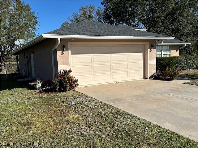 garage featuring driveway