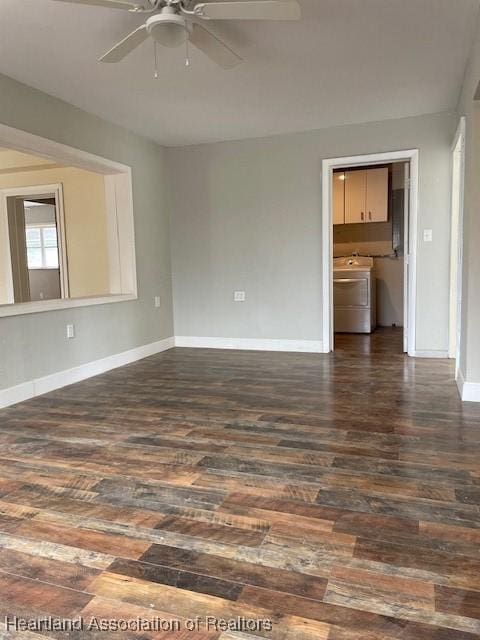 unfurnished living room with ceiling fan, washer / dryer, and dark hardwood / wood-style floors