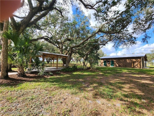 203 Boyer St, Venus, FL 33960 - view of yard featuring an outbuilding