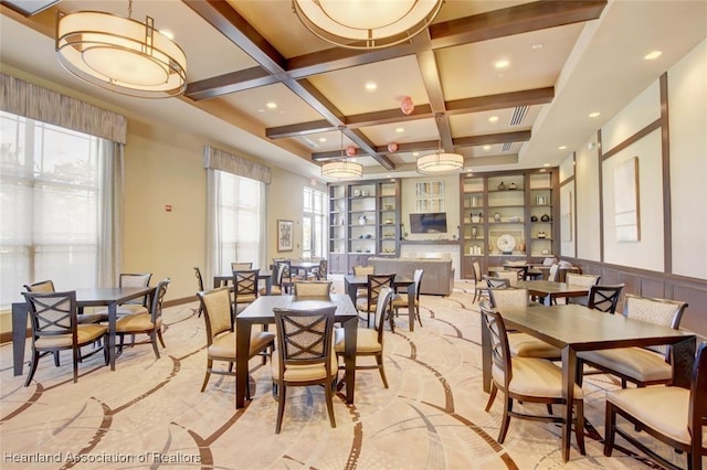 dining room featuring coffered ceiling, built in features, and beam ceiling