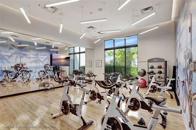 gym with light wood-type flooring