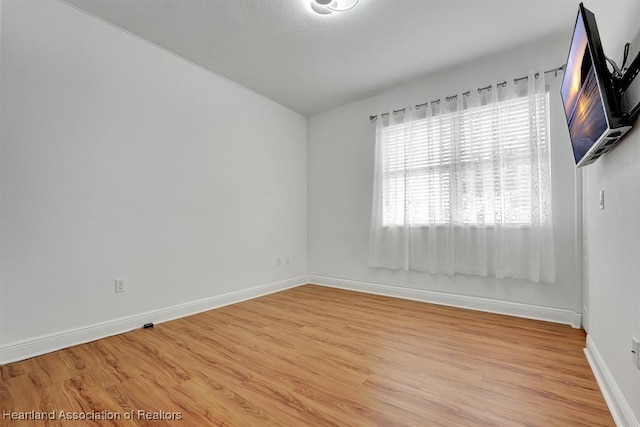 empty room featuring light hardwood / wood-style floors