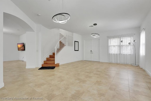 interior space featuring a notable chandelier