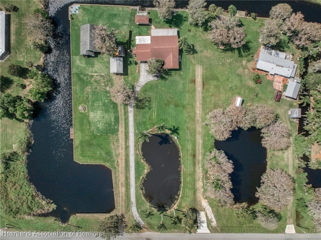bird's eye view with a water view