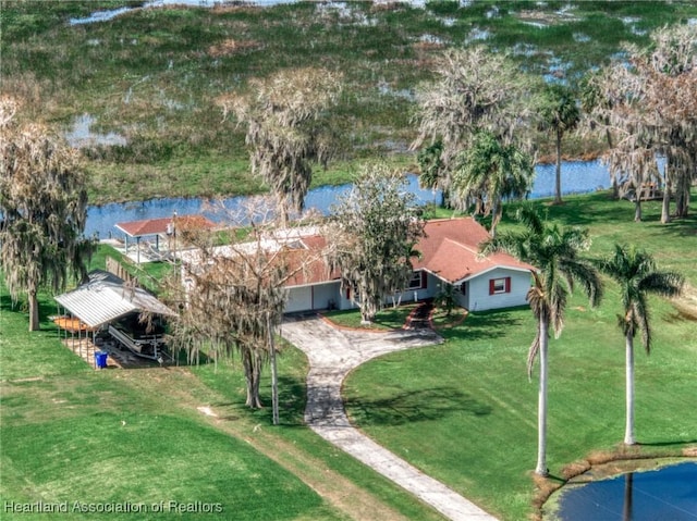 birds eye view of property featuring a water view