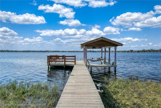 dock area featuring a water view