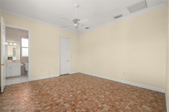 spare room with crown molding and ceiling fan