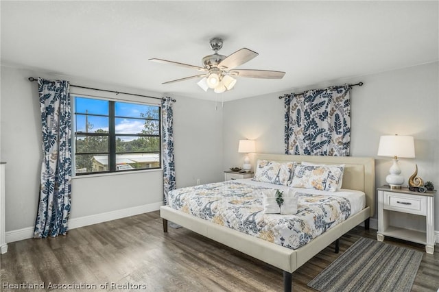 bedroom featuring dark hardwood / wood-style floors and ceiling fan