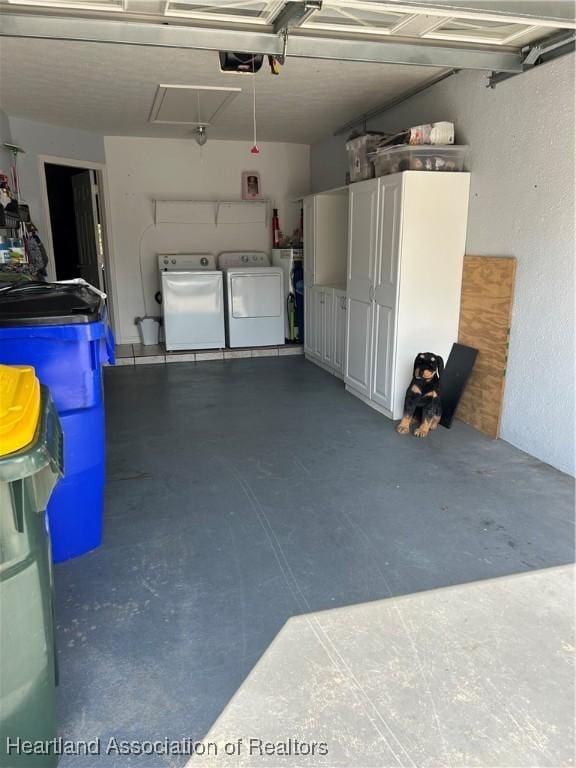 garage with independent washer and dryer