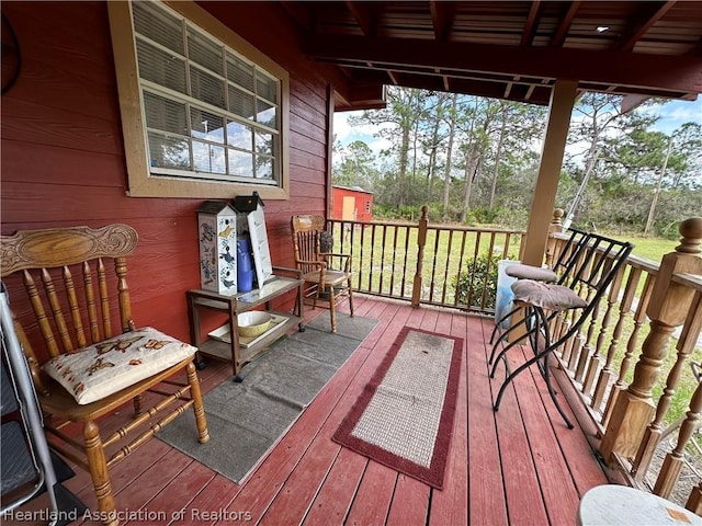 wooden deck with a porch