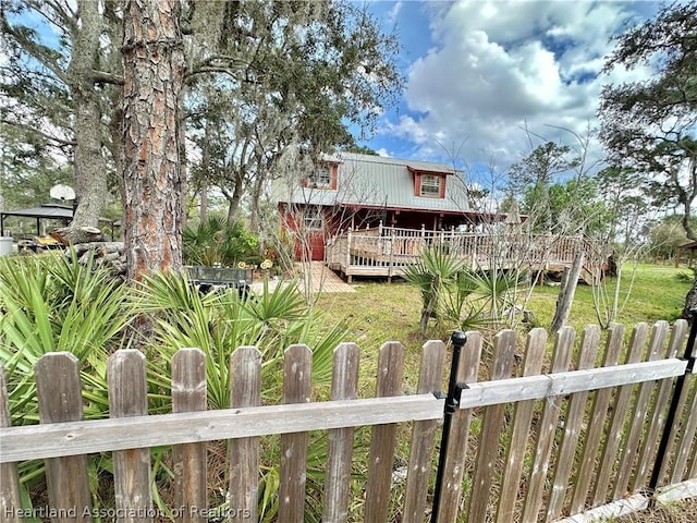 view of front of house with a deck