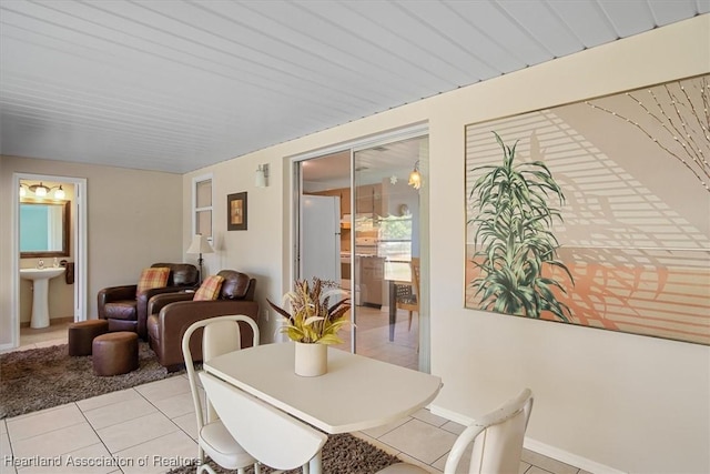 dining room featuring light tile patterned flooring