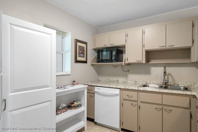 kitchen with dishwasher, open shelves, black microwave, and a sink