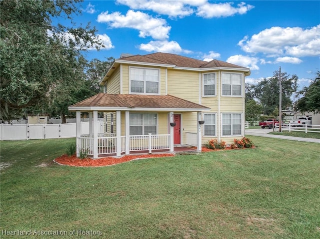 view of front of home featuring a porch and a front lawn