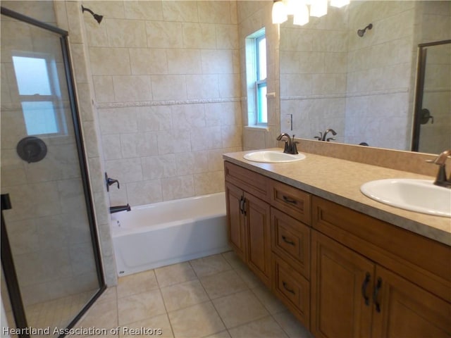 bathroom with tile patterned floors and vanity