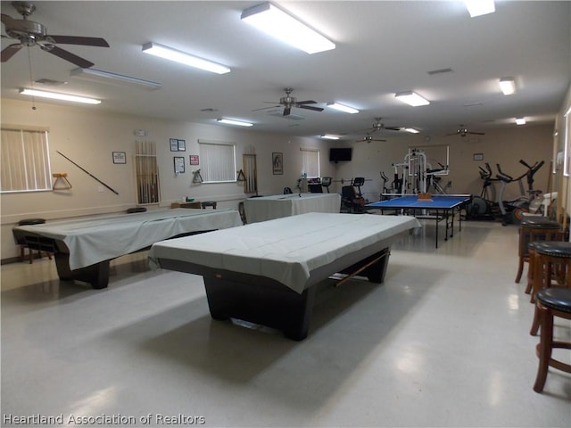 rec room with ceiling fan, concrete floors, and pool table