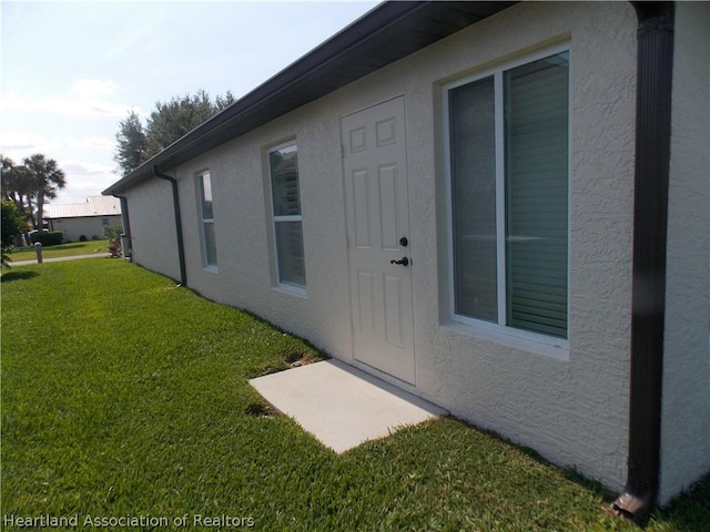 exterior space with a lawn