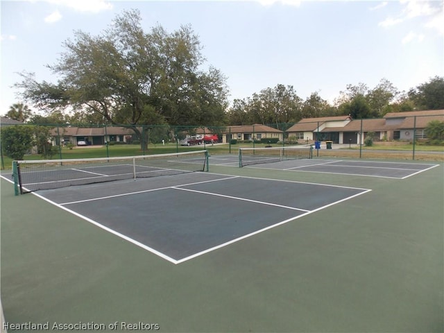 view of tennis court with basketball court