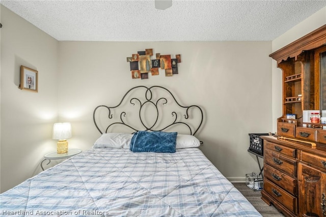 bedroom with a textured ceiling