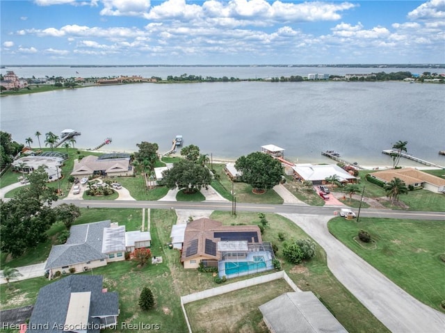 drone / aerial view with a water view