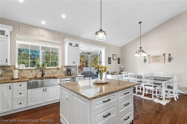 5931 Fig Rd, Sebring, FL 33875 - kitchen with dark wood finished floors, decorative backsplash, and a sink