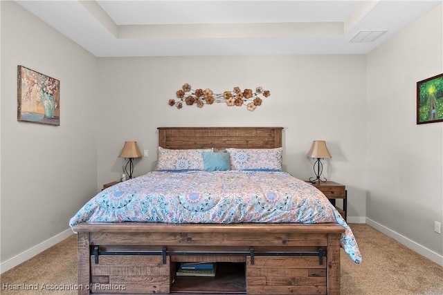 5931 Fig Rd, Sebring, FL 33875 - bedroom with visible vents, baseboards, carpet, and a raised ceiling