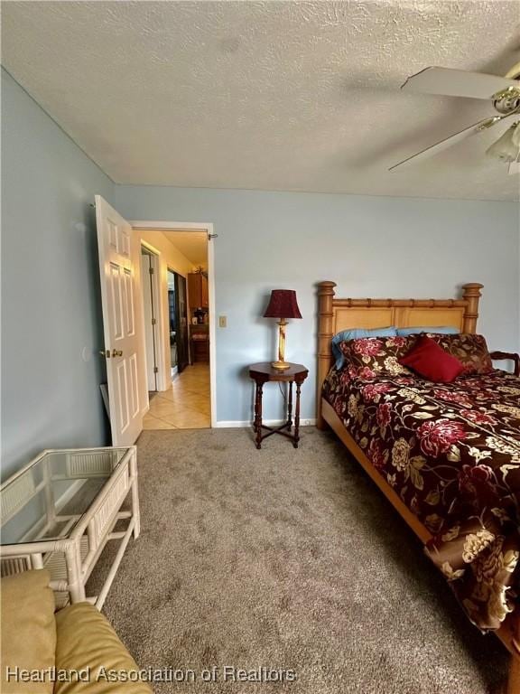 302 Whatley Blvd, Sebring, FL 33870 - bedroom with carpet, a ceiling fan, and a textured ceiling