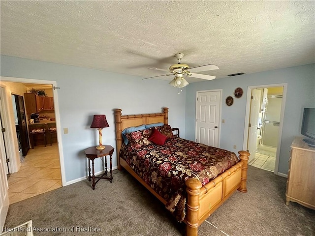302 Whatley Blvd, Sebring, FL 33870 - carpeted bedroom with tile patterned flooring, a textured ceiling, a ceiling fan, ensuite bathroom, and baseboards