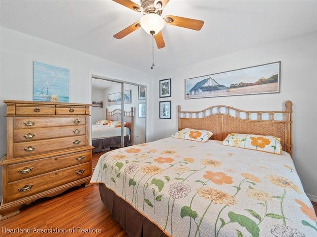 123 Harry Lee Rd, Lake Placid, FL 33852 - bedroom featuring ceiling fan, wood-type flooring, and a closet
