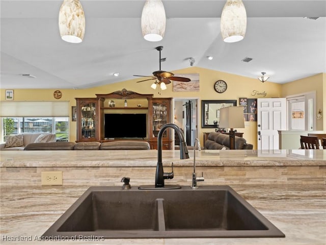 123 Harry Lee Rd, Lake Placid, FL 33852 - kitchen featuring lofted ceiling, sink, hanging light fixtures, and ceiling fan