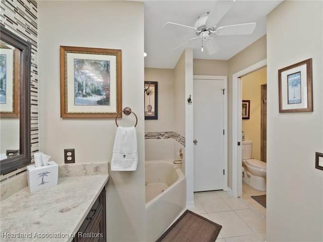 123 Harry Lee Rd, Lake Placid, FL 33852 - bathroom featuring ceiling fan, tile patterned flooring, vanity, a tub, and toilet