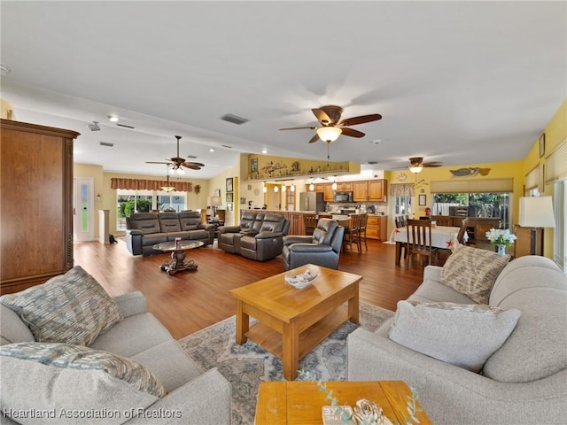 123 Harry Lee Rd, Lake Placid, FL 33852 - living room featuring lofted ceiling and light wood-type flooring