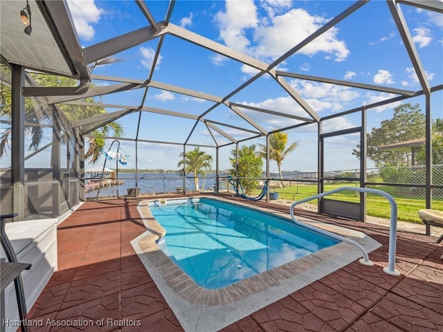 123 Harry Lee Rd, Lake Placid, FL 33852 - view of swimming pool with a water view, a lanai, and a patio