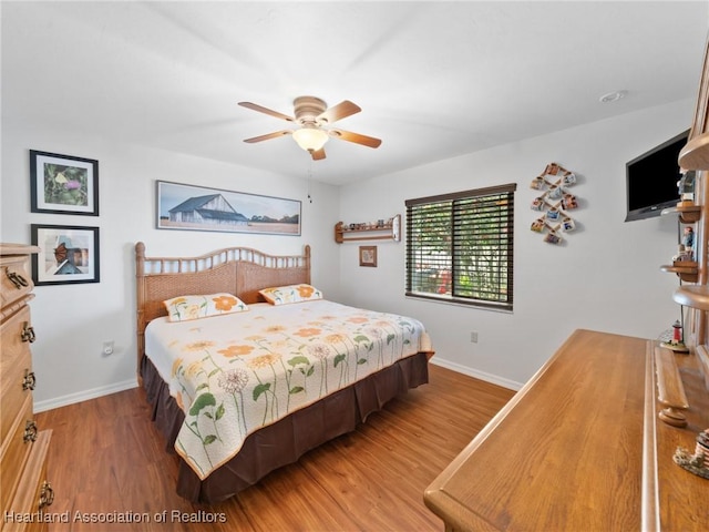 123 Harry Lee Rd, Lake Placid, FL 33852 - bedroom with dark wood-type flooring and ceiling fan