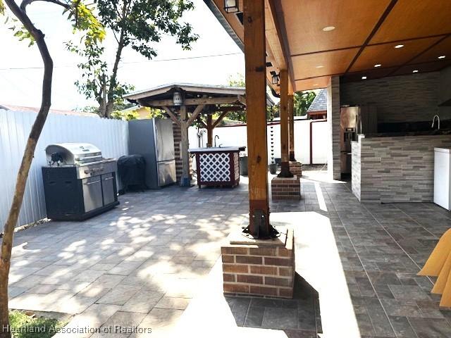 view of patio with area for grilling