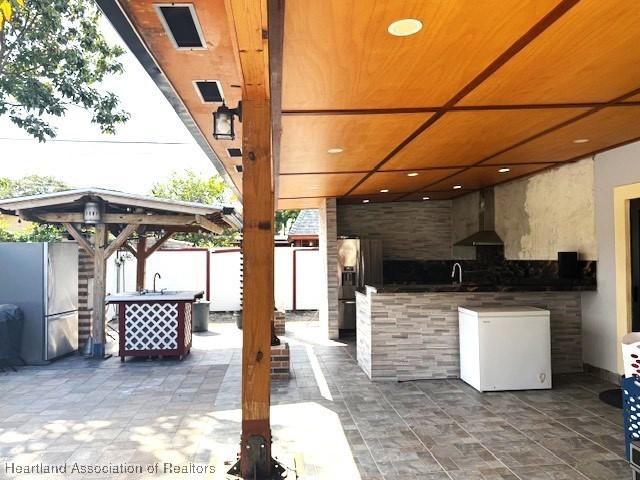 view of patio featuring sink