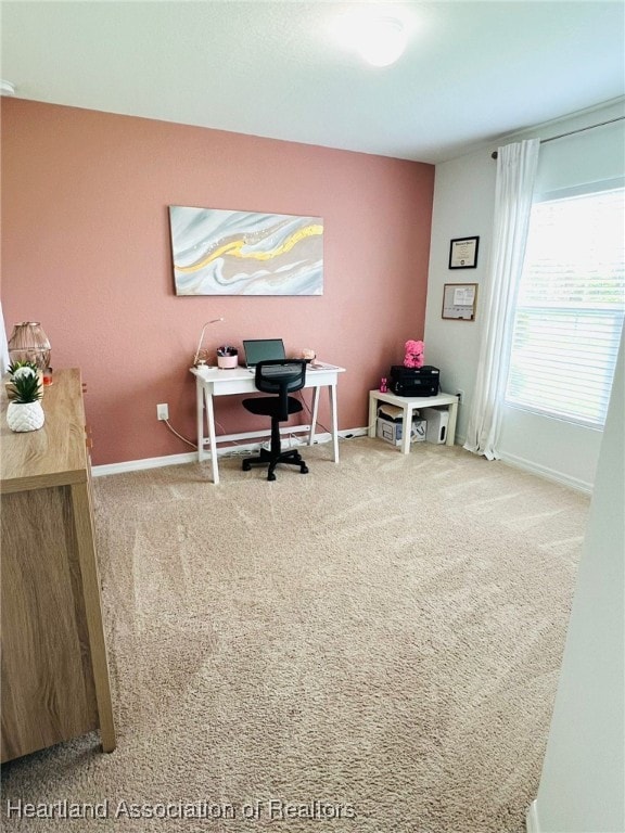 5310 Pebble Dr, Sebring, FL 33872 - carpeted home office with baseboards