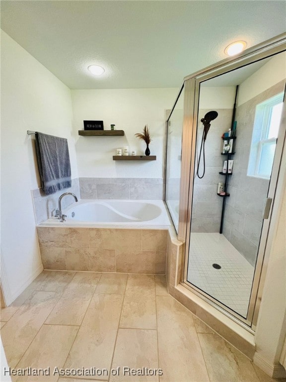 5310 Pebble Dr, Sebring, FL 33872 - full bath with a garden tub and a stall shower