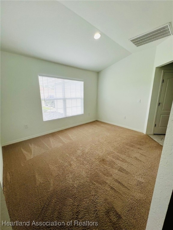 5310 Pebble Dr, Sebring, FL 33872 - carpeted empty room featuring baseboards and recessed lighting