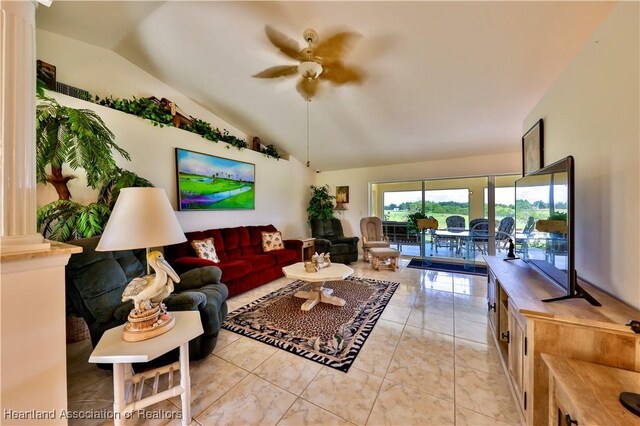 kitchen featuring decorative light fixtures, tasteful backsplash, dark countertops, vaulted ceiling, and white appliances