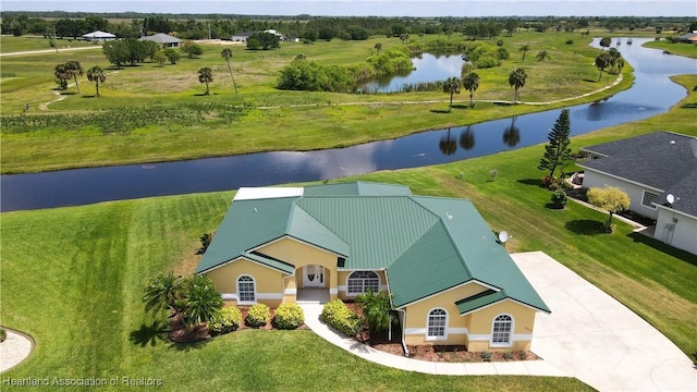 bird's eye view with a water view
