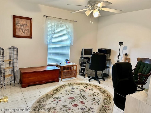 office area featuring light tile patterned flooring and ceiling fan