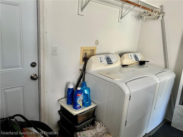 laundry area featuring washing machine and dryer